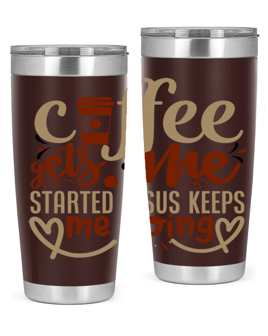 A stylish stainless steel tumbler with the phrase 'Coffee Gets Me Started, Jesus Keeps Me Going' printed on it, showcasing its double wall vacuum insulation.