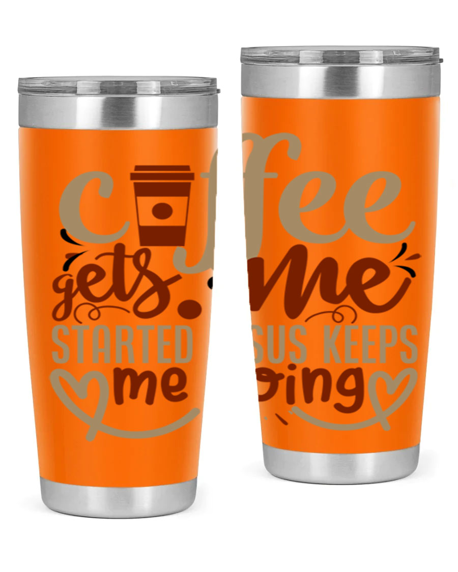 A stylish stainless steel tumbler with the phrase 'Coffee Gets Me Started, Jesus Keeps Me Going' printed on it, showcasing its double wall vacuum insulation.