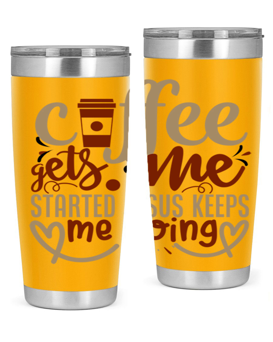 A stylish stainless steel tumbler with the phrase 'Coffee Gets Me Started, Jesus Keeps Me Going' printed on it, showcasing its double wall vacuum insulation.