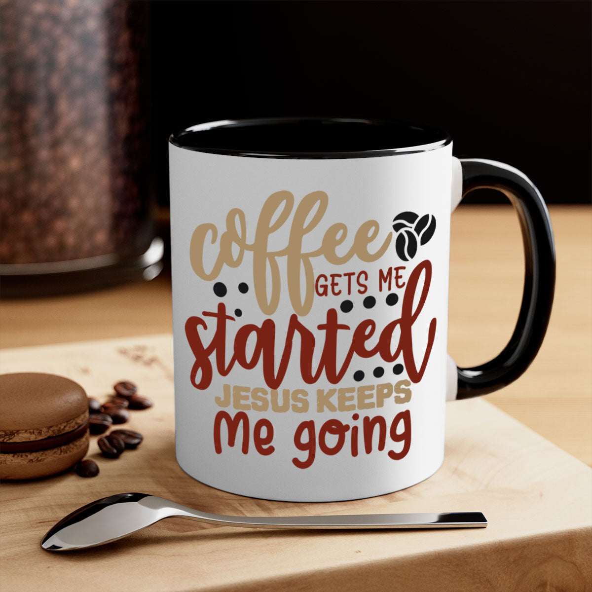Ceramic coffee mug with the phrase 'Coffee Gets Me Started Jesus Keeps Me Going', featuring a glossy finish and a colored handle.