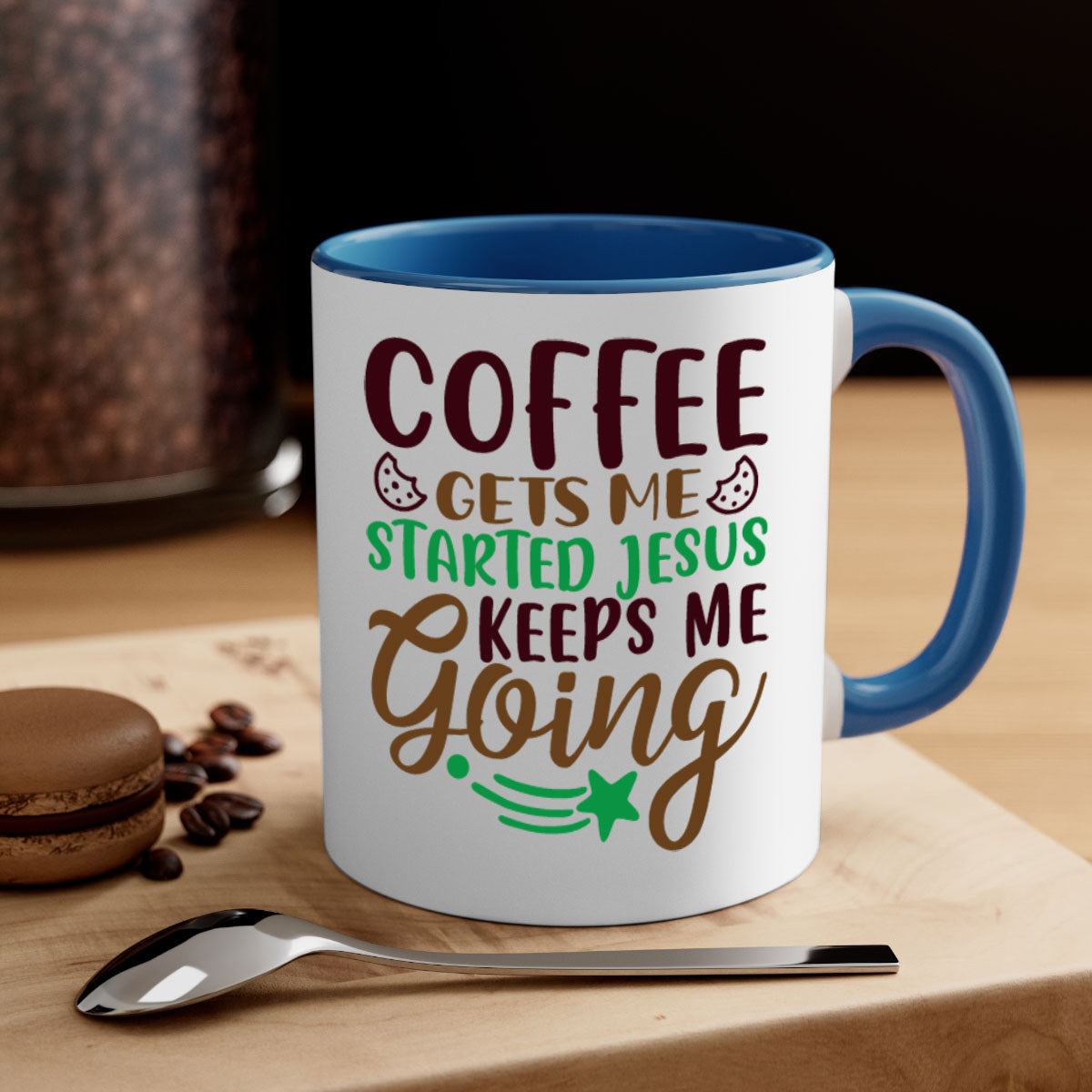 Ceramic coffee mug with a glossy finish featuring the phrase 'Coffee Gets Me Started, Jesus Keeps Me Going' in a stylish design.