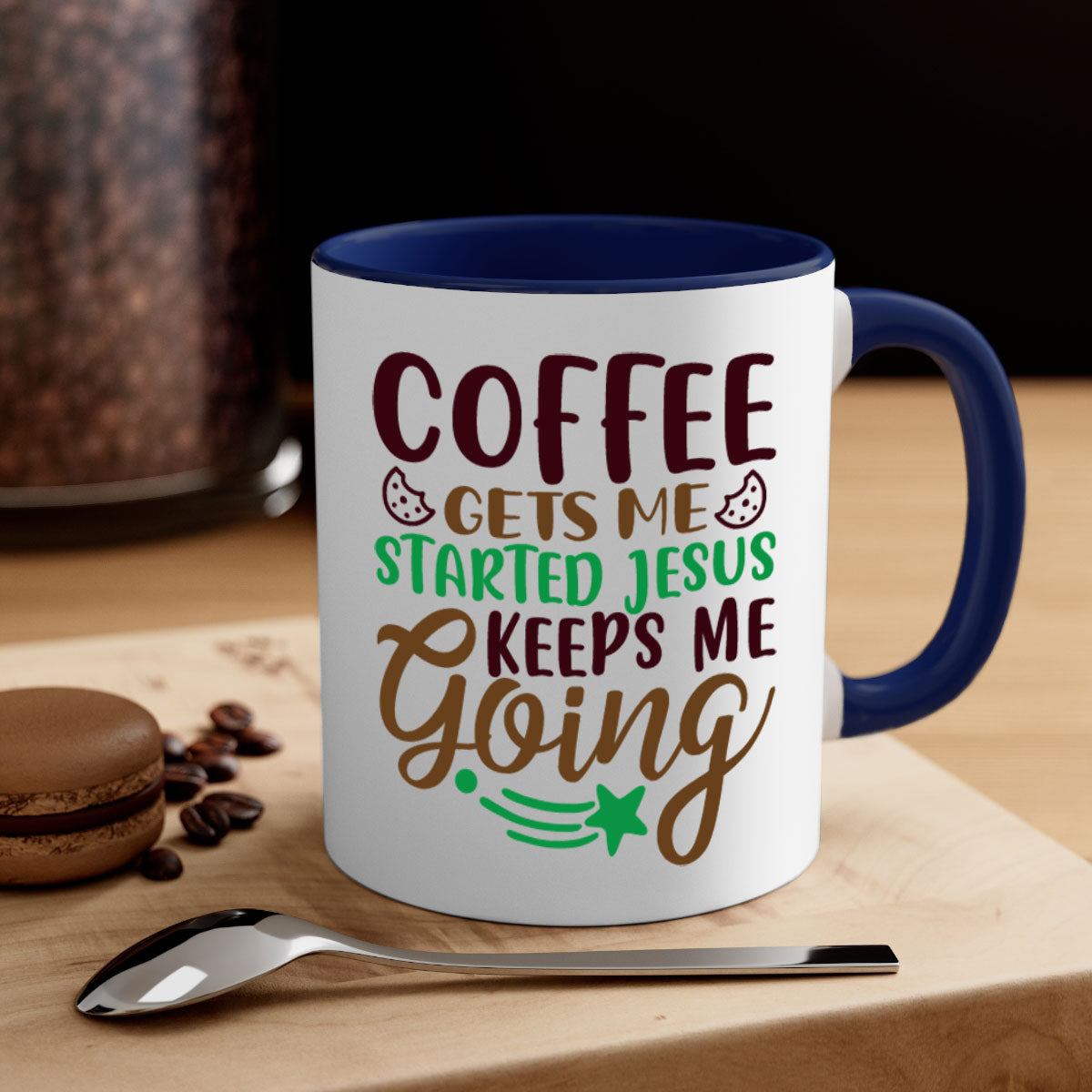 Ceramic coffee mug with a glossy finish featuring the phrase 'Coffee Gets Me Started, Jesus Keeps Me Going' in a stylish design.