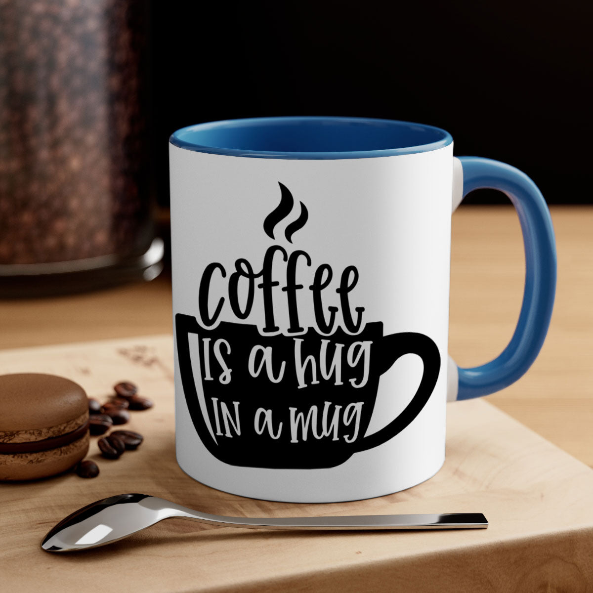 A stylish two-tone coffee mug with a colored handle and interior, featuring the phrase 'Coffee is a Hug in a Mug'. Available in multiple colors.