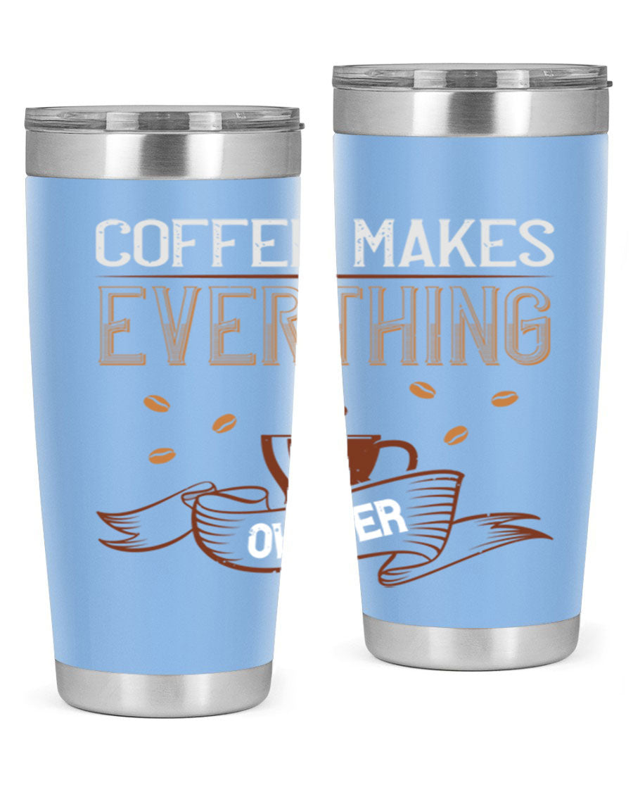 A stylish 'Coffee Makes Everything Okayer' tumbler in stainless steel with a drink-thru lid, perfect for hot and cold beverages.