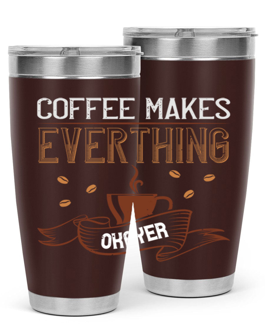 A stylish 'Coffee Makes Everything Okayer' tumbler in stainless steel with a drink-thru lid, perfect for hot and cold beverages.