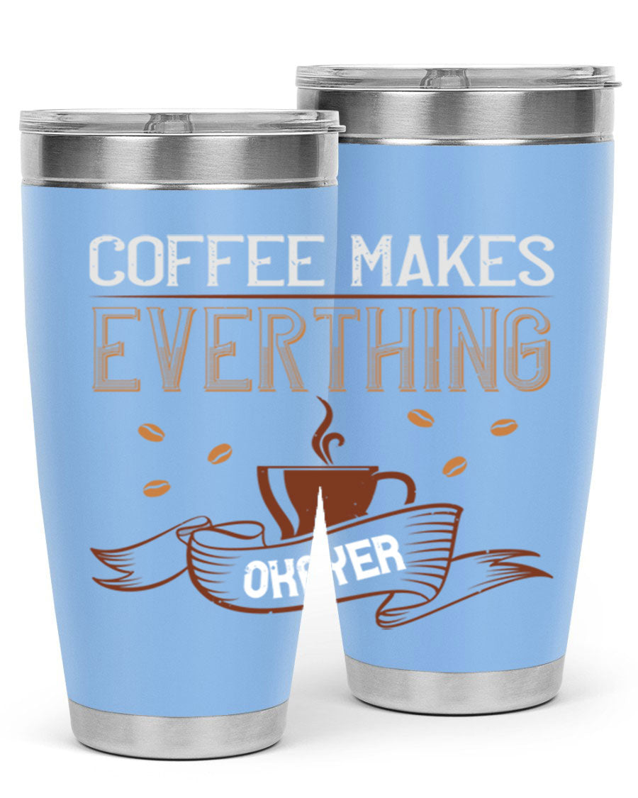 A stylish 'Coffee Makes Everything Okayer' tumbler in stainless steel with a drink-thru lid, perfect for hot and cold beverages.