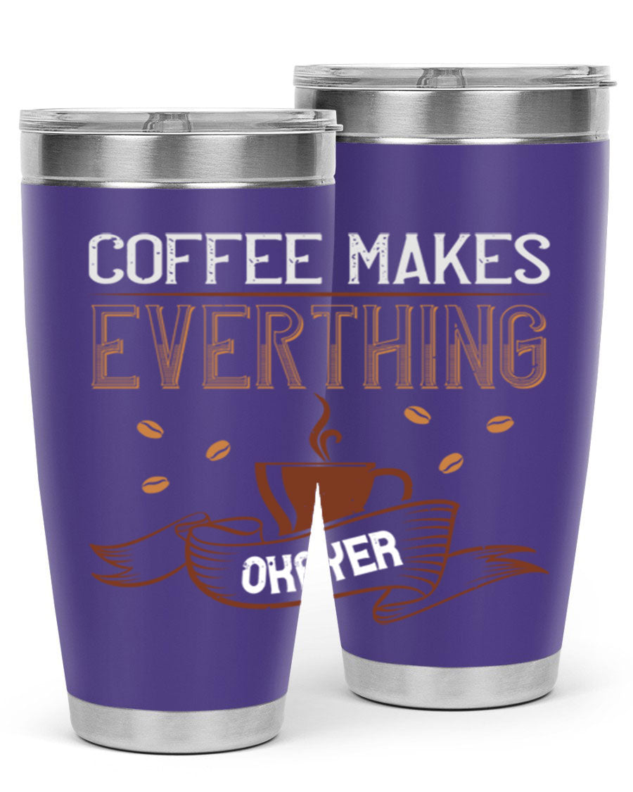 A stylish 'Coffee Makes Everything Okayer' tumbler in stainless steel with a drink-thru lid, perfect for hot and cold beverages.