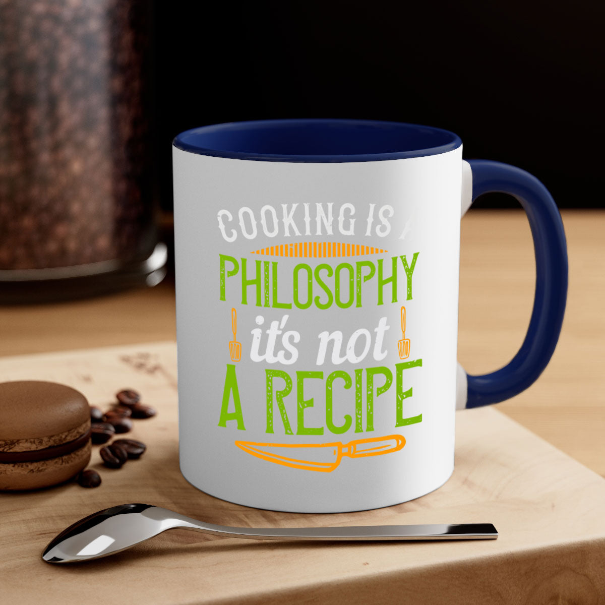 Two-tone ceramic coffee mug with colored handle and glossy finish, featuring the phrase 'Cooking is a Philosophy, It's Not a Recipe'.
