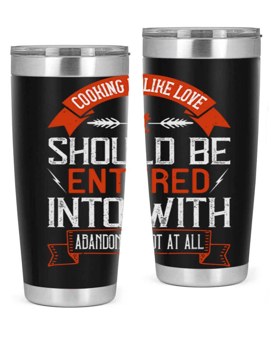 A stylish 20oz and 30oz stainless steel tumbler featuring the phrase 'Cooking is Like Love' with a double wall vacuum design for temperature retention.