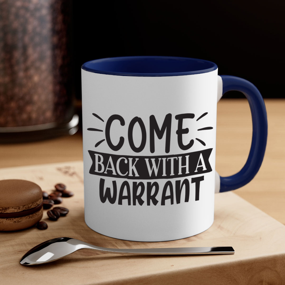 Come Back With a Warrant 82# Mug featuring a glossy finish and colorful handle, available in two sizes.