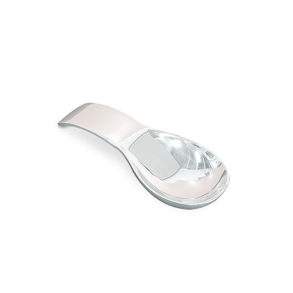 Contemporary-designed spoon rest made from recycled aluminum with a chic hand-cast finish, featuring a wavy elongated shape.