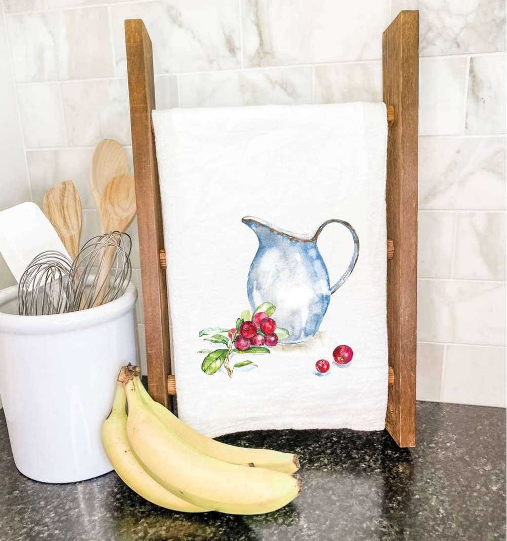 Cranberries with Pitcher cotton tea towel featuring vibrant colors and hemmed edges, perfect for kitchen use.