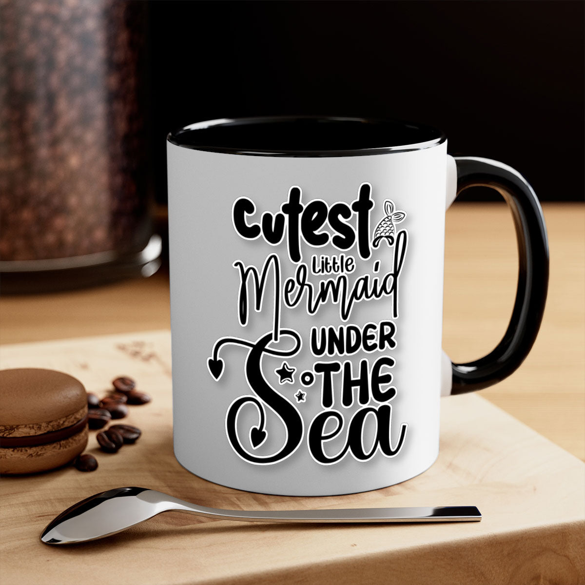 A colorful ceramic mug featuring a cute little mermaid design, available in multiple colors with a glossy finish and a C-shaped handle.