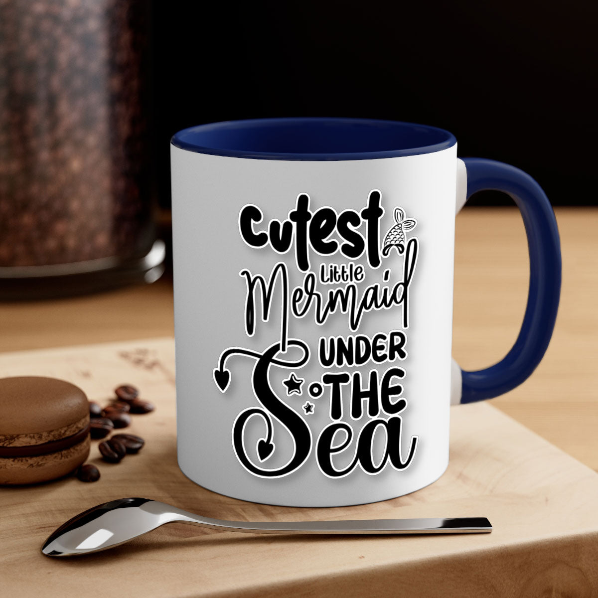A colorful ceramic mug featuring a cute little mermaid design, available in multiple colors with a glossy finish and a C-shaped handle.