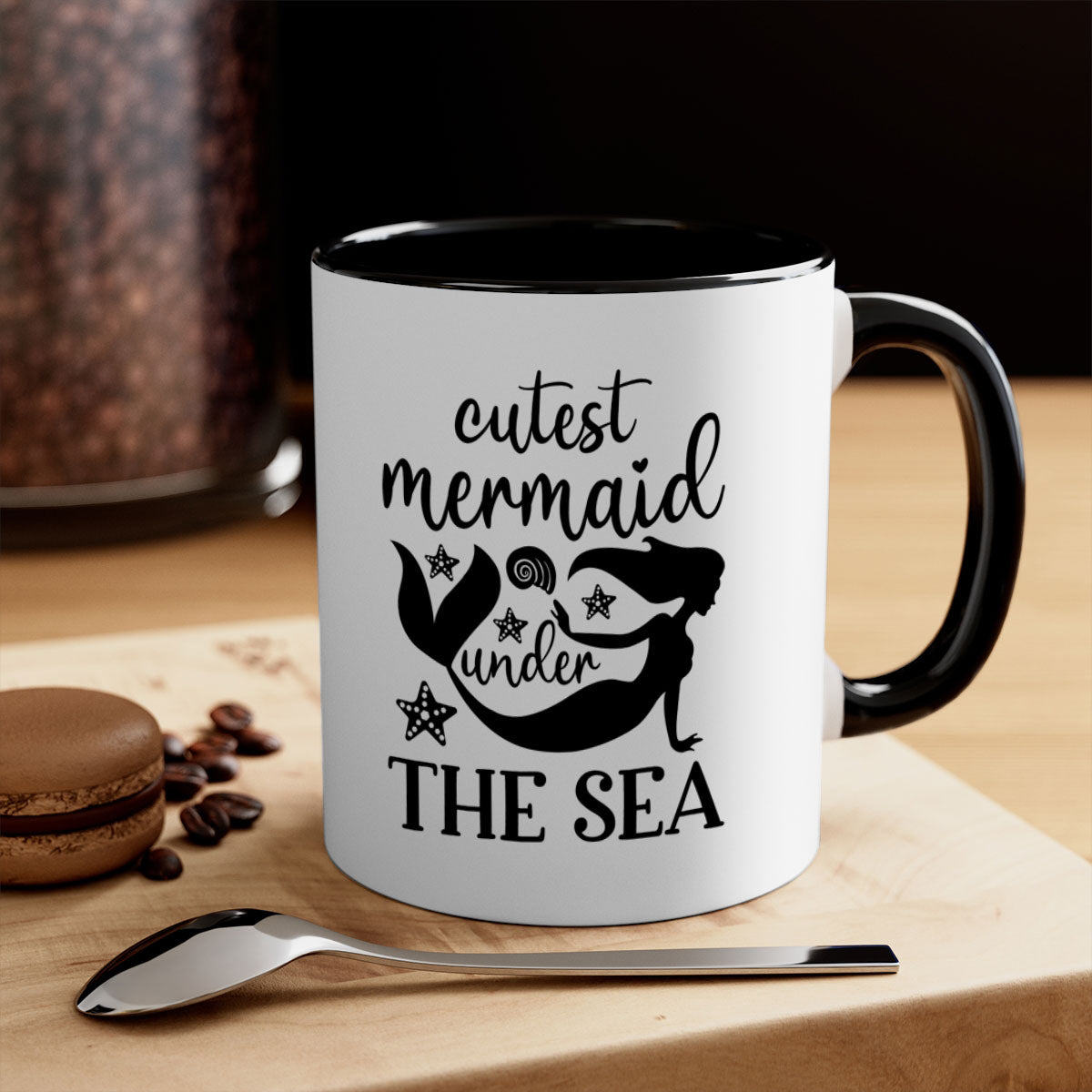 A cute ceramic mug featuring a mermaid design with a glossy finish, available in multiple colors and sizes.