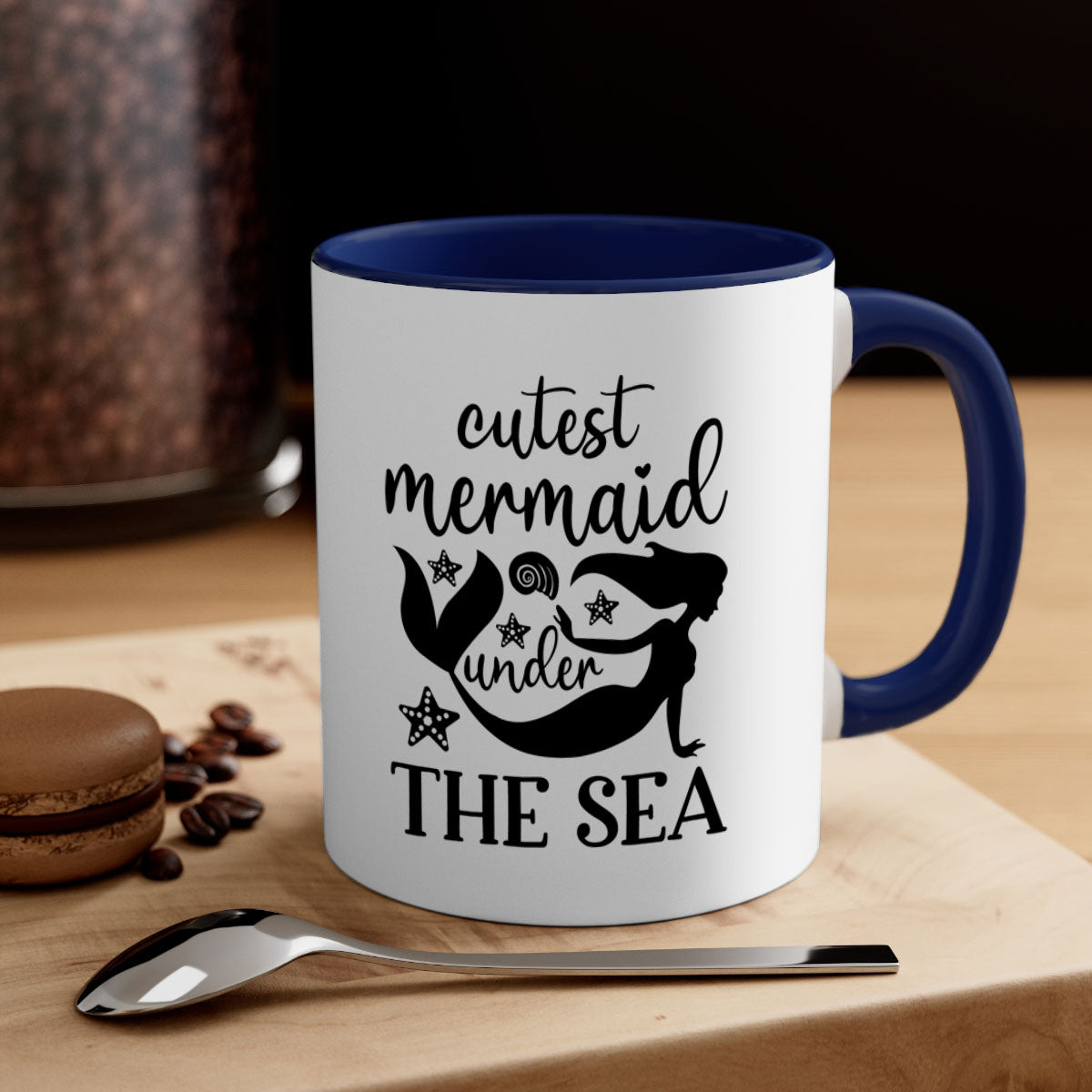 A cute ceramic mug featuring a mermaid design with a glossy finish, available in multiple colors and sizes.