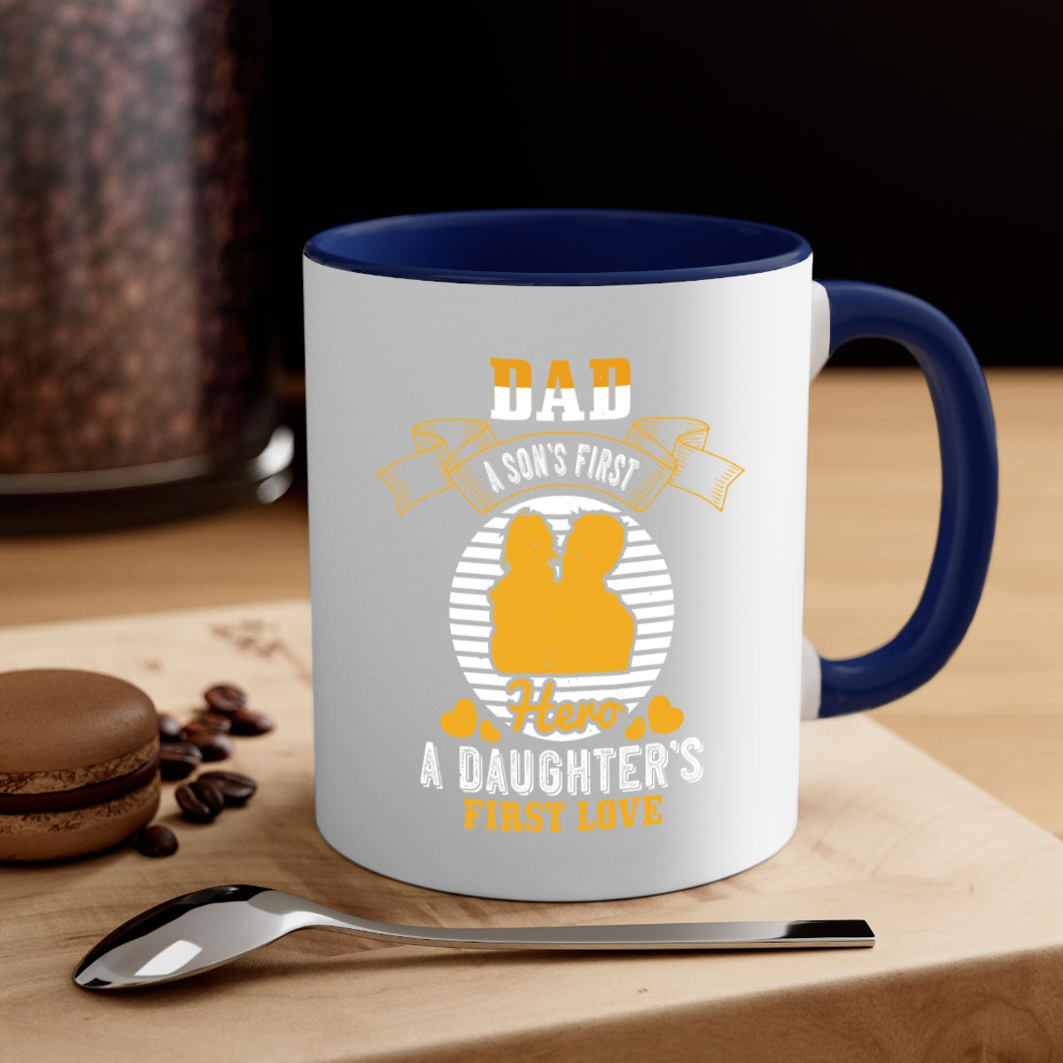 Ceramic coffee mug with 'Dad a Son’s First Hero' design, featuring a colored handle and glossy finish, available in multiple colors.