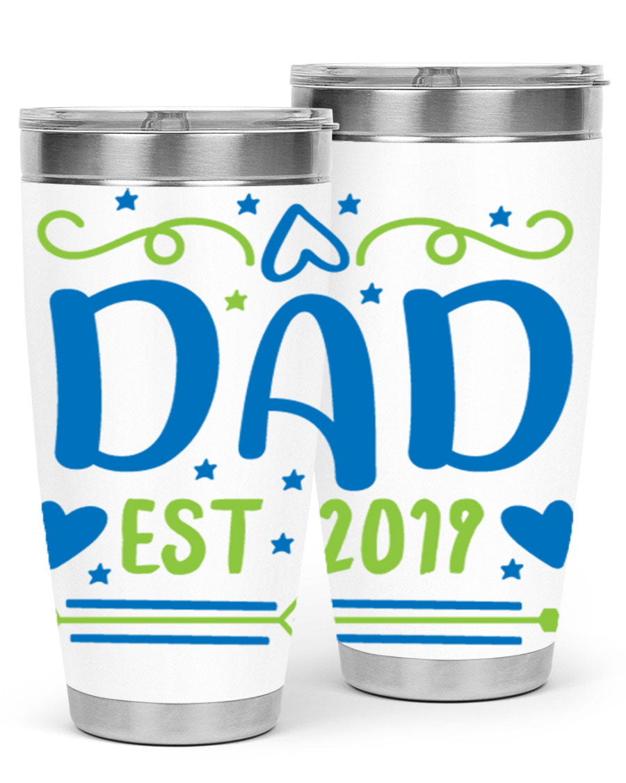 A stylish 'Dad est 99#' tumbler in stainless steel, showcasing its double wall vacuum design and drink-thru lid.
