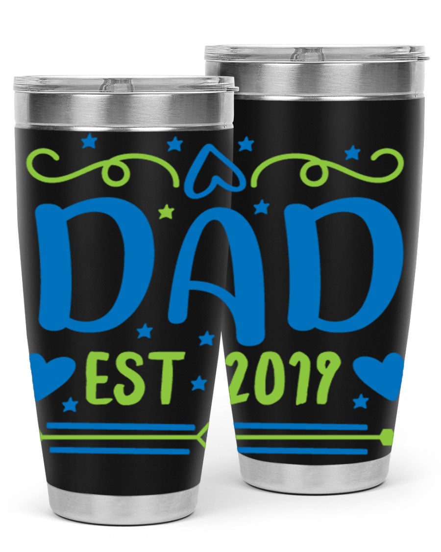 A stylish 'Dad est 99#' tumbler in stainless steel, showcasing its double wall vacuum design and drink-thru lid.