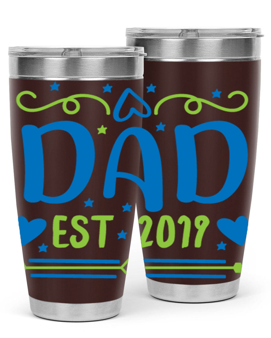 A stylish 'Dad est 99#' tumbler in stainless steel, showcasing its double wall vacuum design and drink-thru lid.