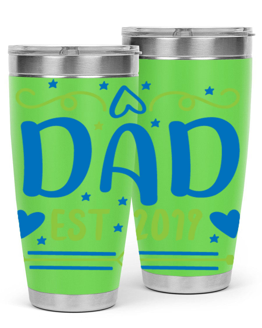 A stylish 'Dad est 99#' tumbler in stainless steel, showcasing its double wall vacuum design and drink-thru lid.