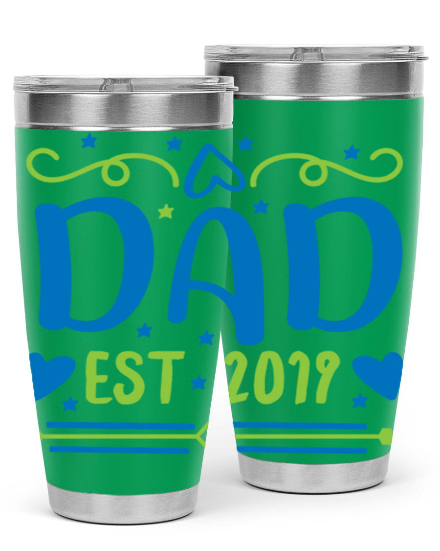 A stylish 'Dad est 99#' tumbler in stainless steel, showcasing its double wall vacuum design and drink-thru lid.
