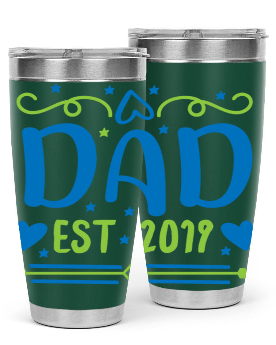 A stylish 'Dad est 99#' tumbler in stainless steel, showcasing its double wall vacuum design and drink-thru lid.