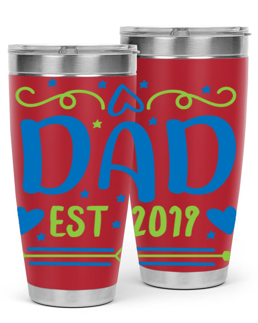 A stylish 'Dad est 99#' tumbler in stainless steel, showcasing its double wall vacuum design and drink-thru lid.
