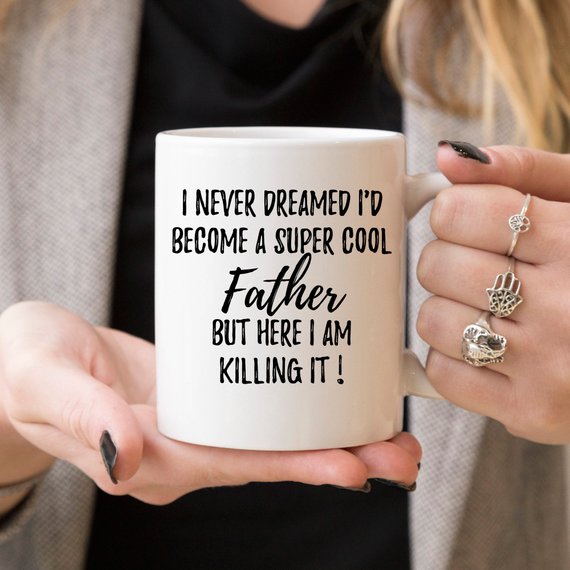 A white ceramic mug featuring a heartfelt design for fathers, showcasing vibrant colors and printed on both sides, perfect for gifting.