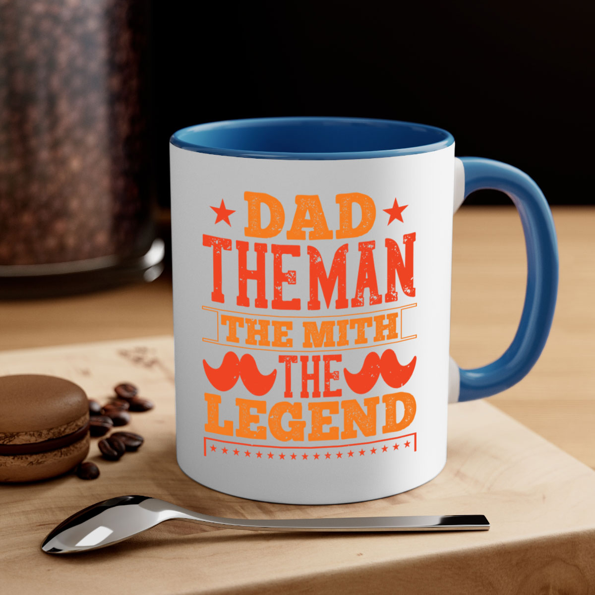 Ceramic coffee mug featuring 'Dad the Man the Myth the Legend' design with a glossy finish and colored handle.