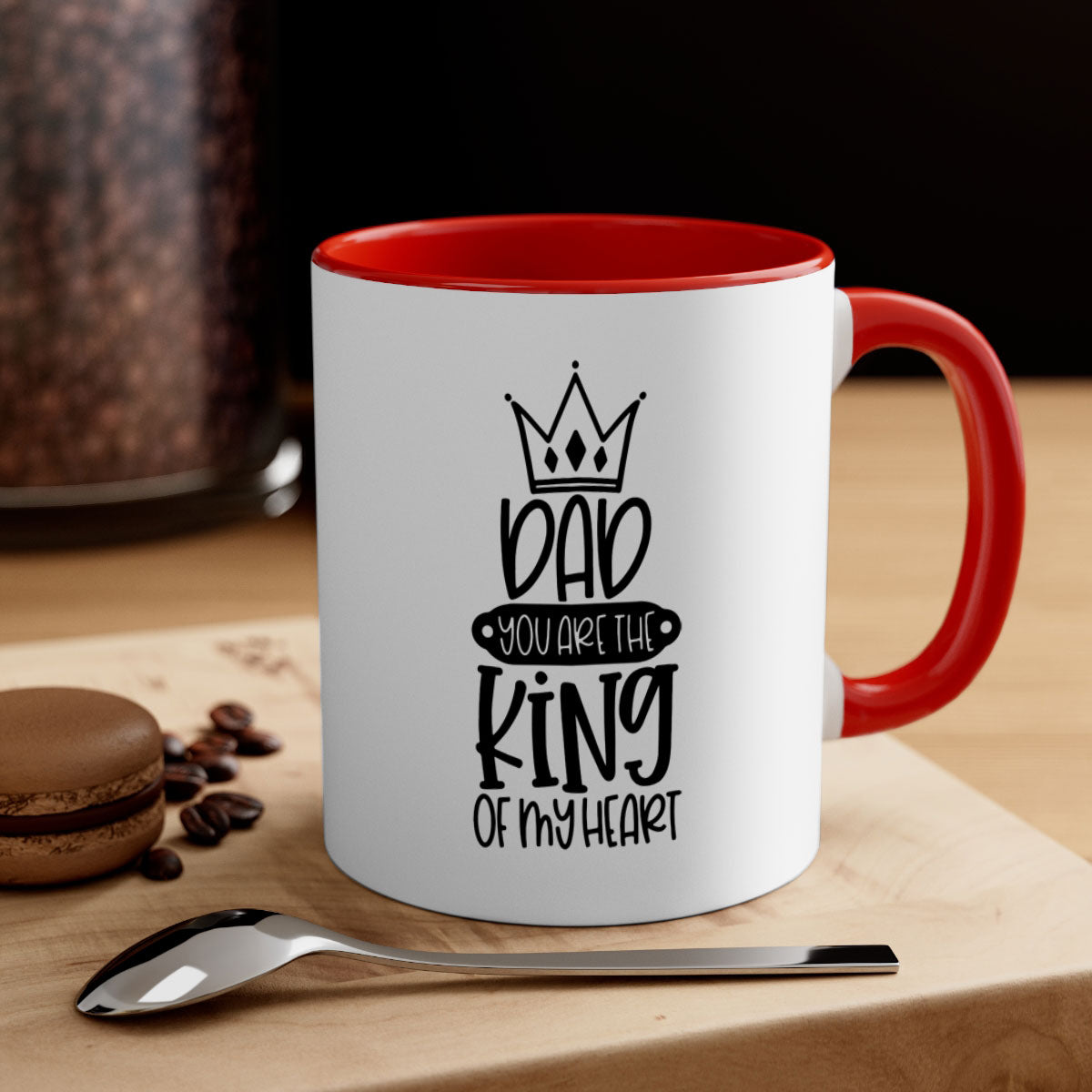 Ceramic coffee mug with 'Dad You Are the King of My Heart' design, featuring a colored handle and glossy finish.