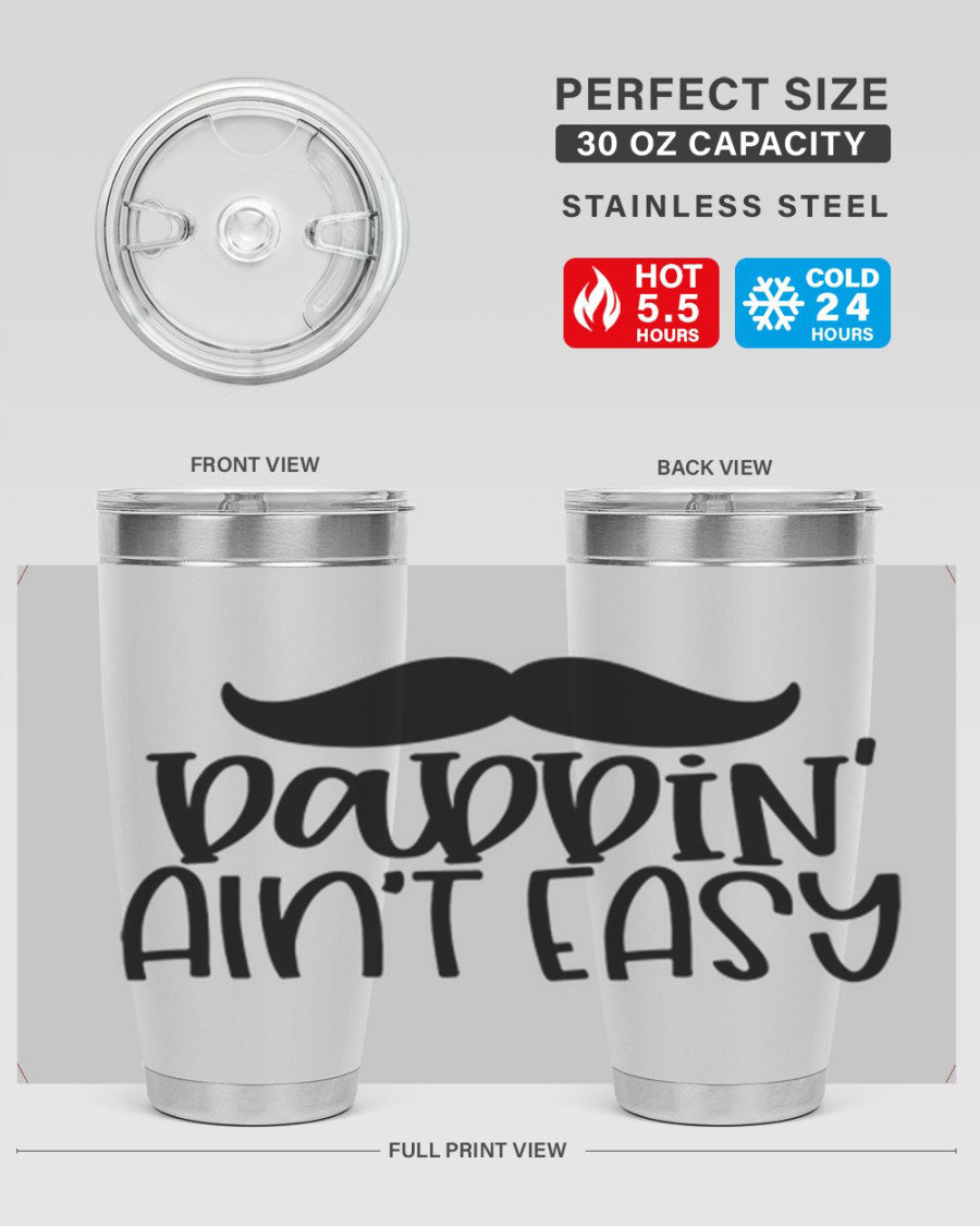 20oz stainless steel tumbler with 'Daddin Aint Easy' print, featuring a drink-thru lid and double wall vacuum insulation.