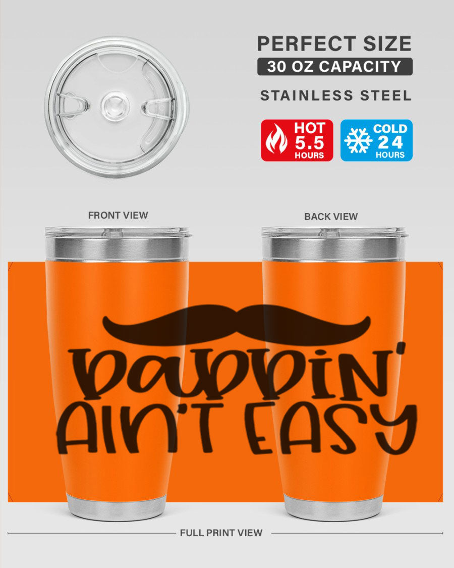 20oz stainless steel tumbler with 'Daddin Aint Easy' print, featuring a drink-thru lid and double wall vacuum insulation.