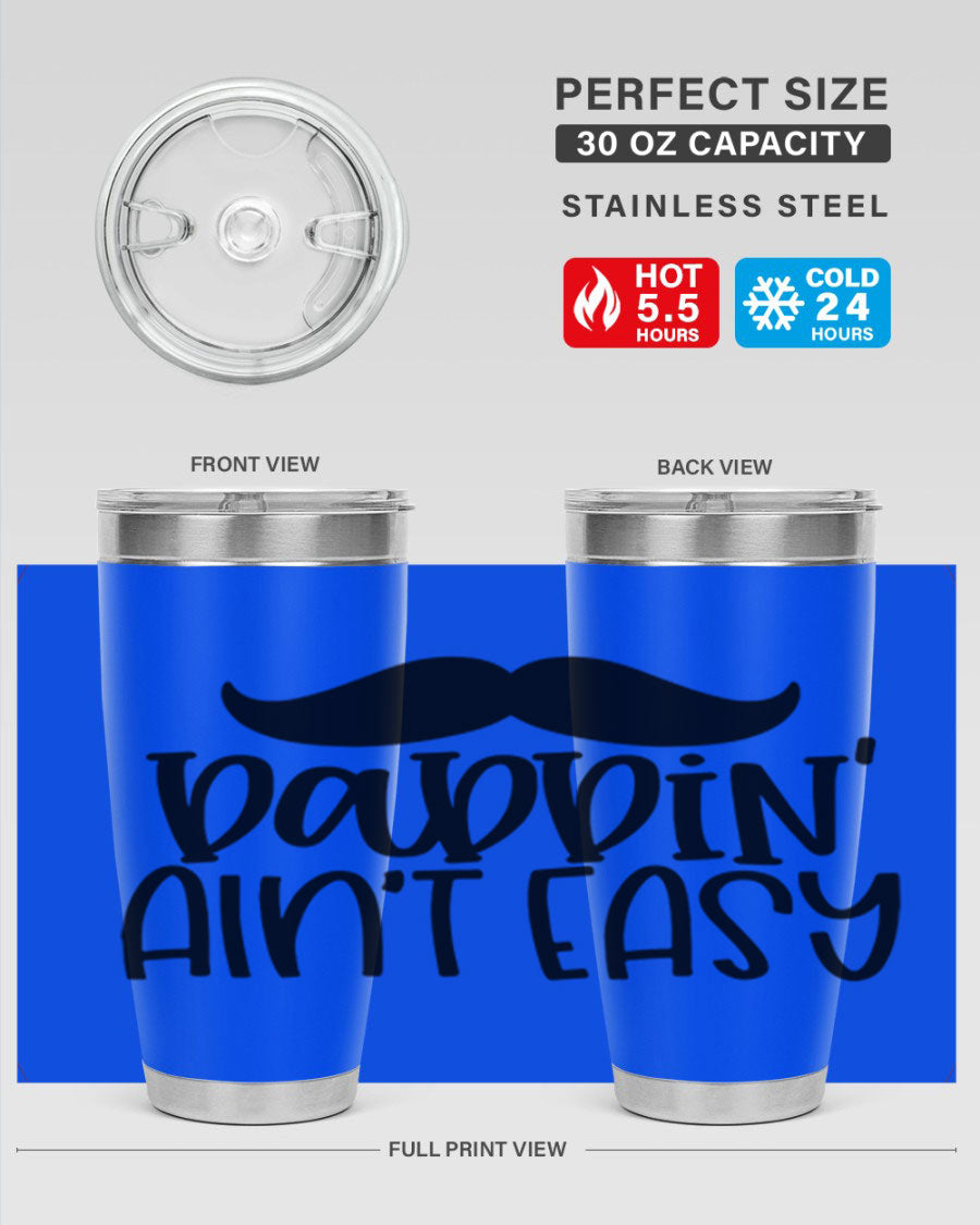 20oz stainless steel tumbler with 'Daddin Aint Easy' print, featuring a drink-thru lid and double wall vacuum insulation.