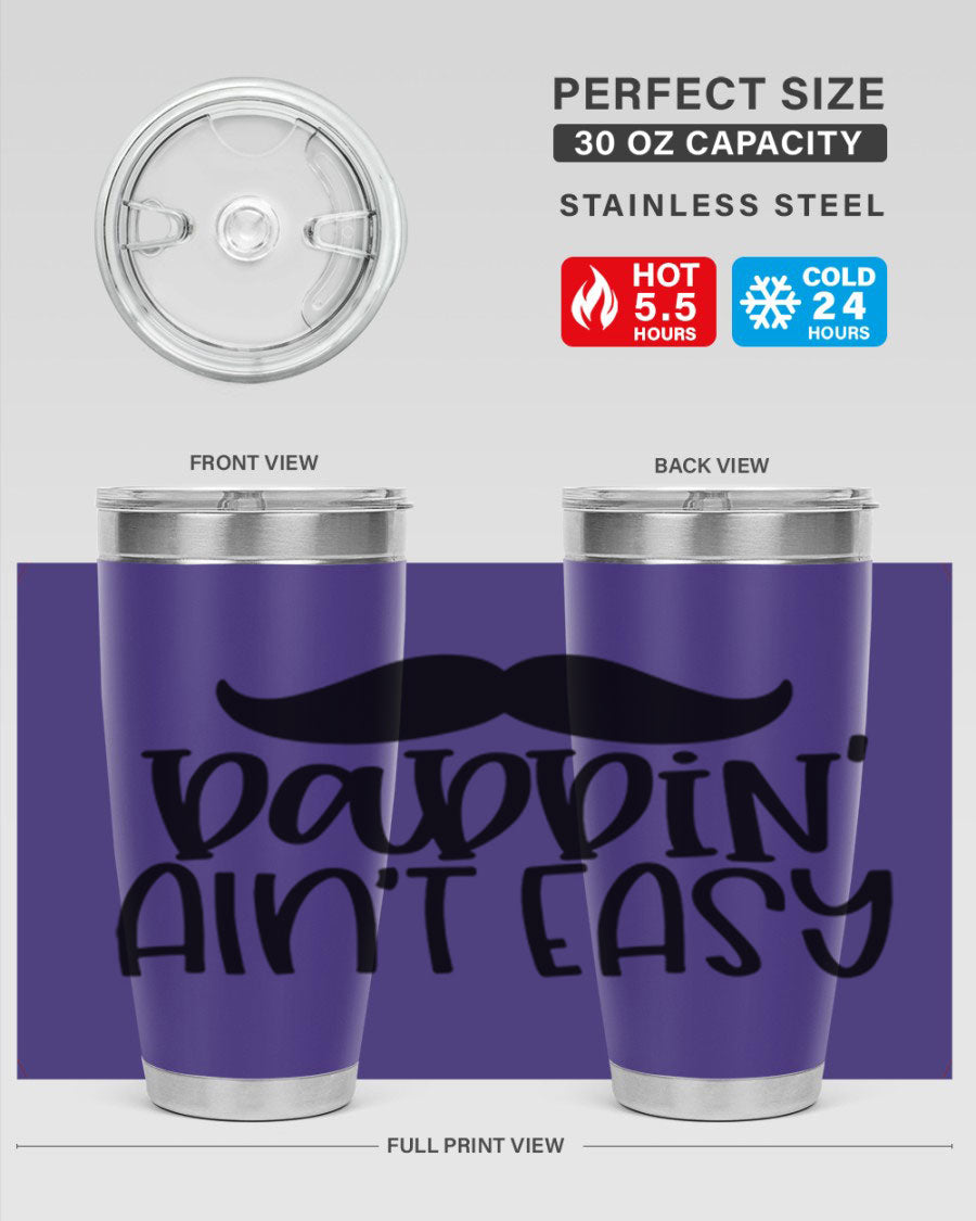20oz stainless steel tumbler with 'Daddin Aint Easy' print, featuring a drink-thru lid and double wall vacuum insulation.