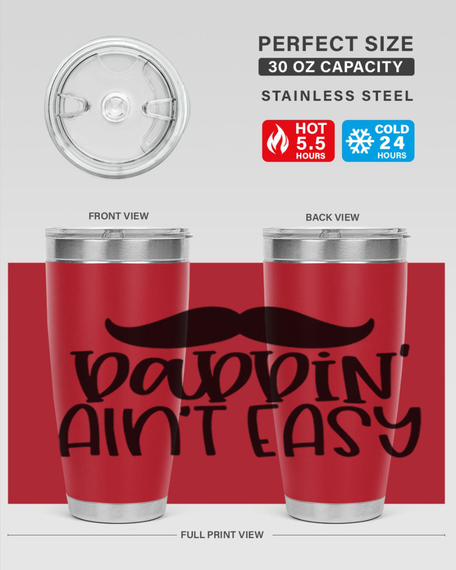 20oz stainless steel tumbler with 'Daddin Aint Easy' print, featuring a drink-thru lid and double wall vacuum insulation.