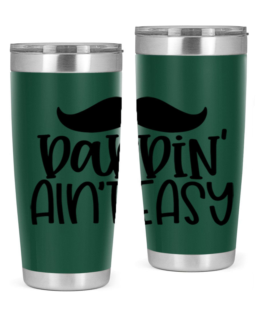 20oz stainless steel tumbler with 'Daddin Aint Easy' print, featuring a drink-thru lid and double wall vacuum insulation.