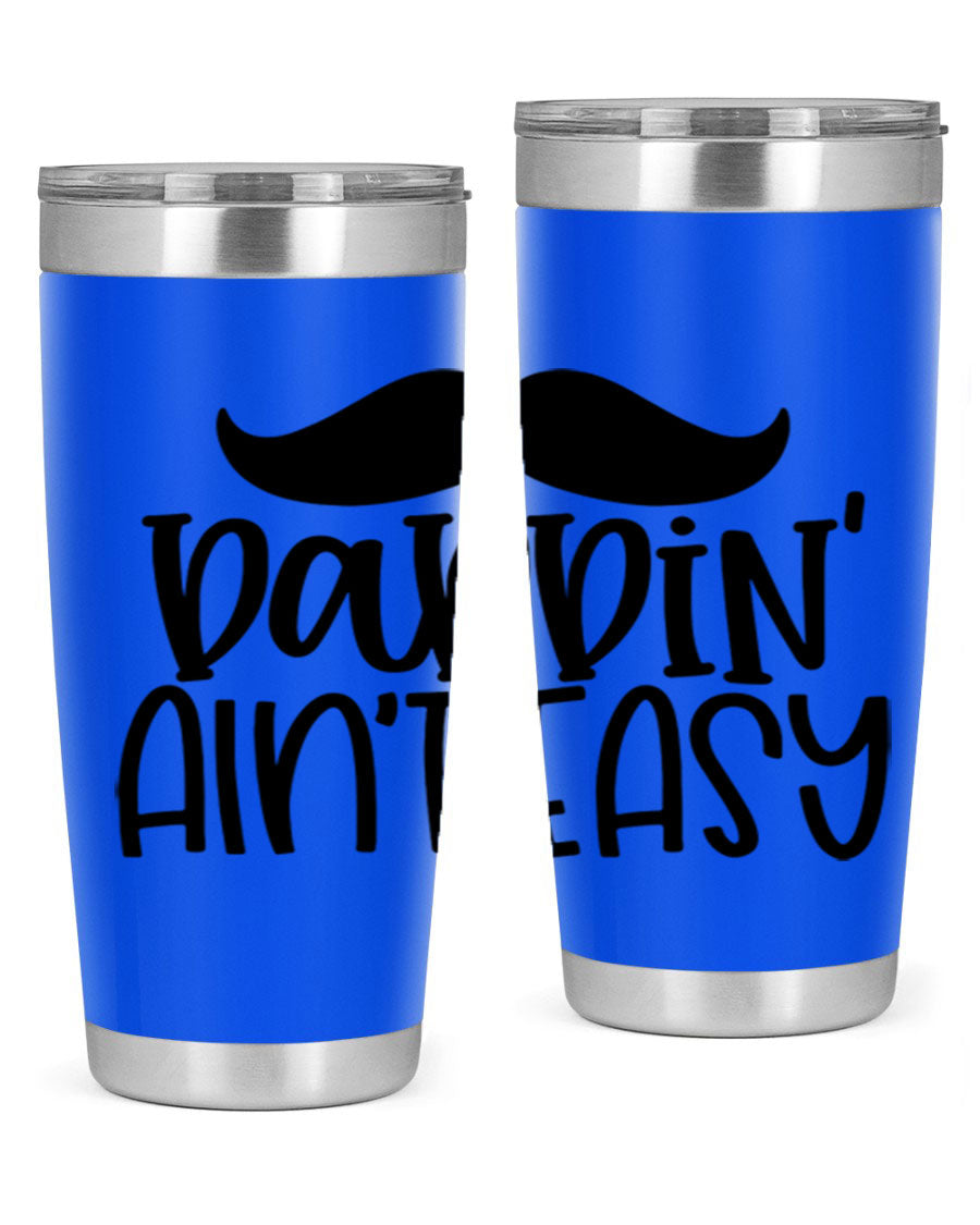 20oz stainless steel tumbler with 'Daddin Aint Easy' print, featuring a drink-thru lid and double wall vacuum insulation.