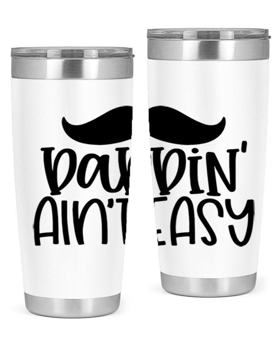 20oz stainless steel tumbler with 'Daddin Aint Easy' print, featuring a drink-thru lid and double wall vacuum insulation.