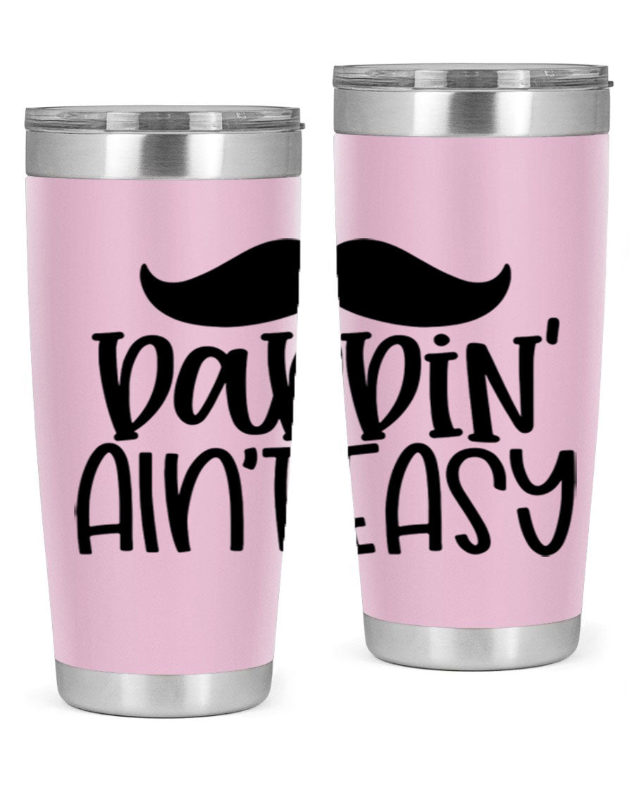 20oz stainless steel tumbler with 'Daddin Aint Easy' print, featuring a drink-thru lid and double wall vacuum insulation.