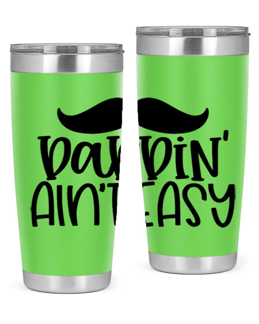20oz stainless steel tumbler with 'Daddin Aint Easy' print, featuring a drink-thru lid and double wall vacuum insulation.