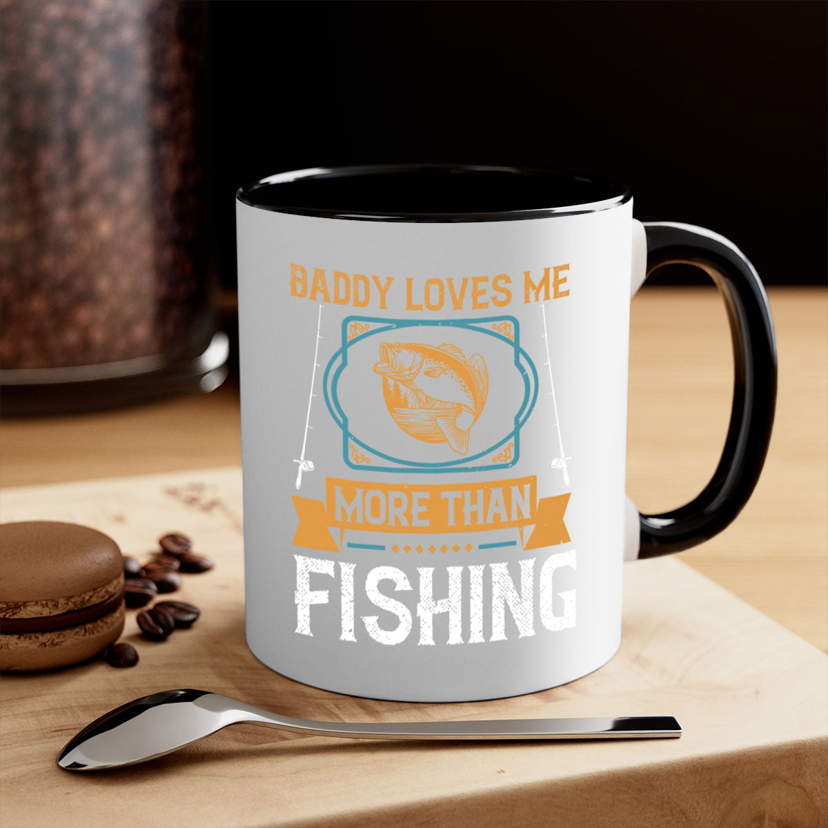 Ceramic coffee mug with 'Daddy Loves Me More Than Fishing' design, featuring a glossy finish and colorful handle.