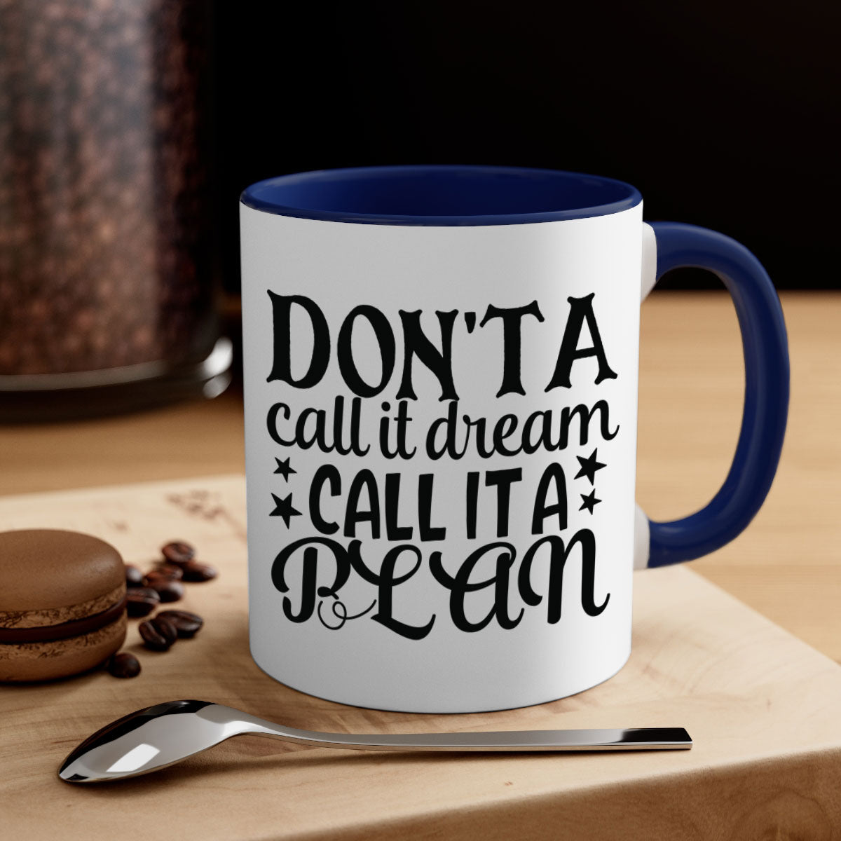 A two-tone ceramic mug featuring the phrase 'Don't Call It a Dream, Call It a Plan' with a glossy finish and colored handle.