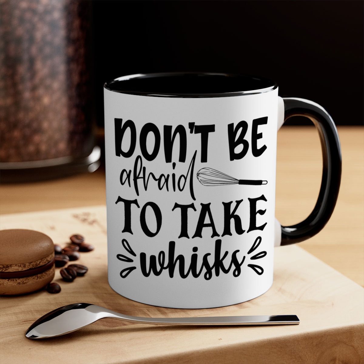 A stylish two-tone ceramic coffee mug with a colored handle and interior, featuring the phrase 'Don't Be Afraid to Take Whisks'.