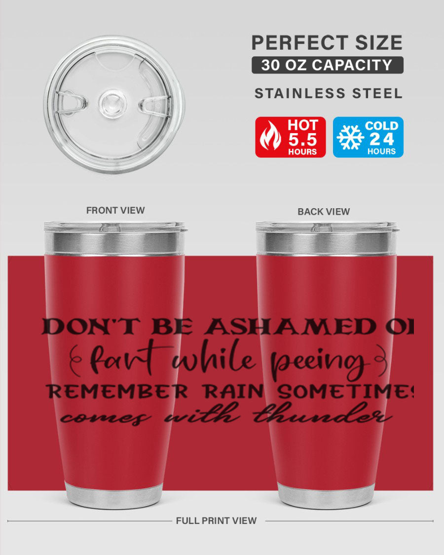 A humorous stainless steel tumbler with the phrase 'Don't be ashamed of fart while peeing, remember rain sometimes comes' printed on it, showcasing its sleek design.