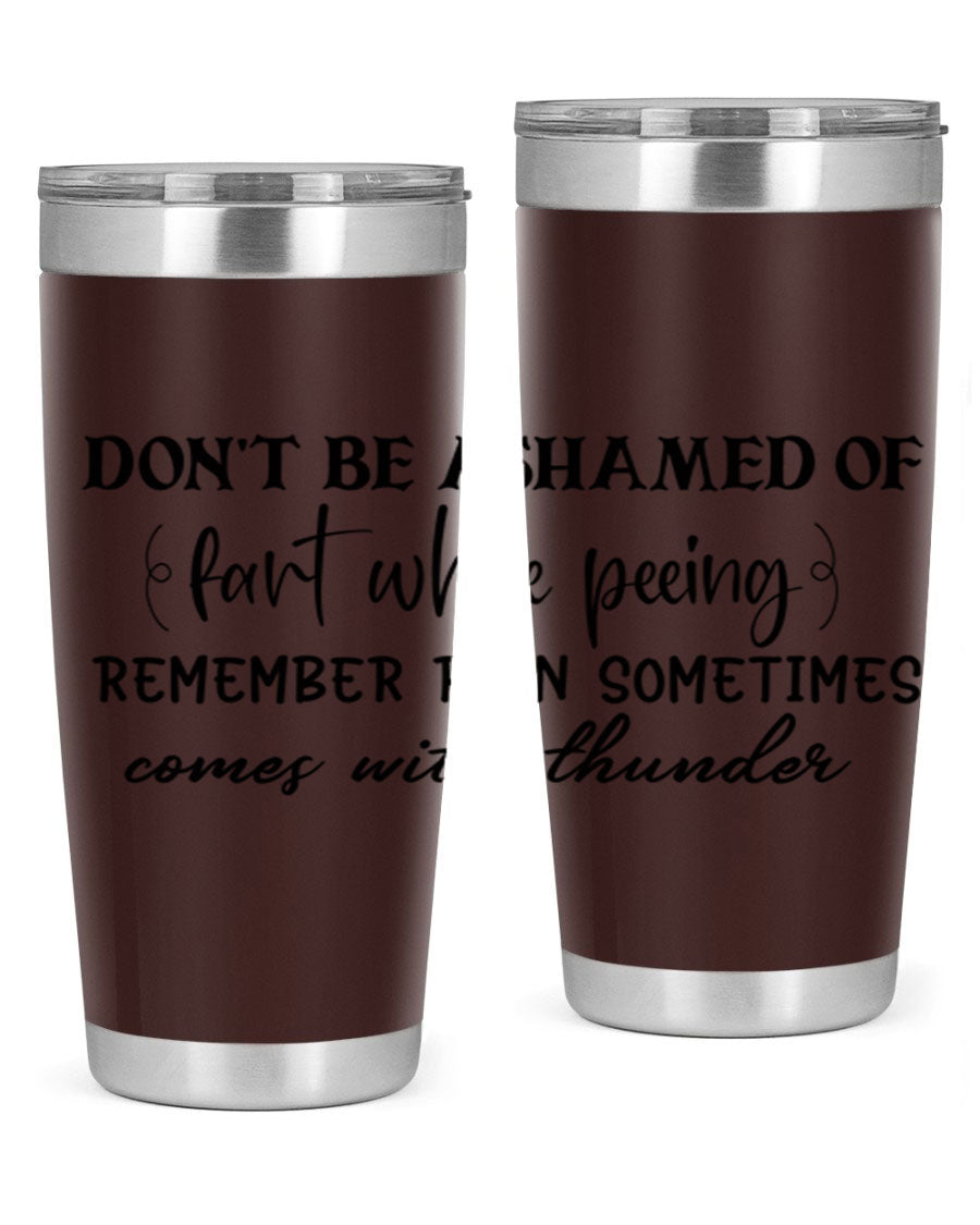 A humorous stainless steel tumbler with the phrase 'Don't be ashamed of fart while peeing, remember rain sometimes comes' printed on it, showcasing its sleek design.