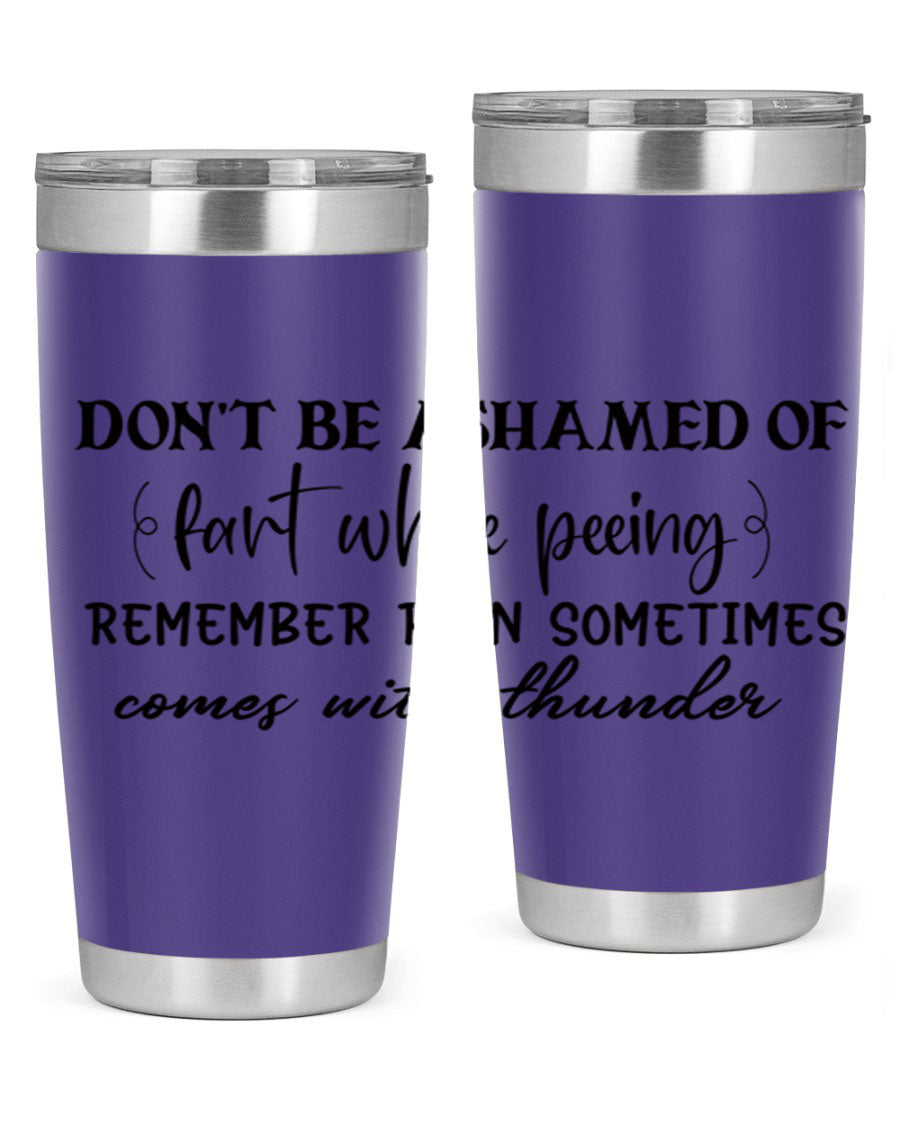 A humorous stainless steel tumbler with the phrase 'Don't be ashamed of fart while peeing, remember rain sometimes comes' printed on it, showcasing its sleek design.