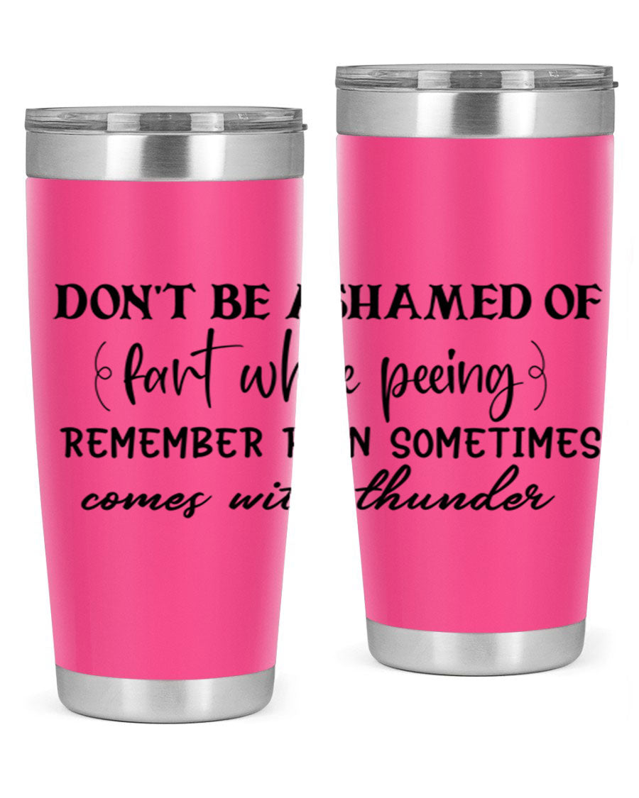A humorous stainless steel tumbler with the phrase 'Don't be ashamed of fart while peeing, remember rain sometimes comes' printed on it, showcasing its sleek design.