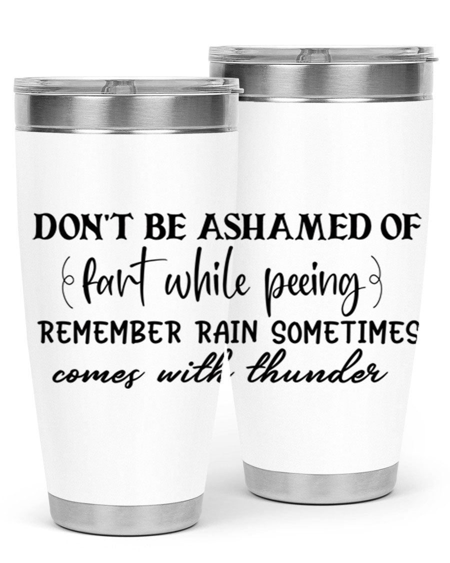A humorous stainless steel tumbler with the phrase 'Don't be ashamed of fart while peeing, remember rain sometimes comes' printed on it, showcasing its sleek design.