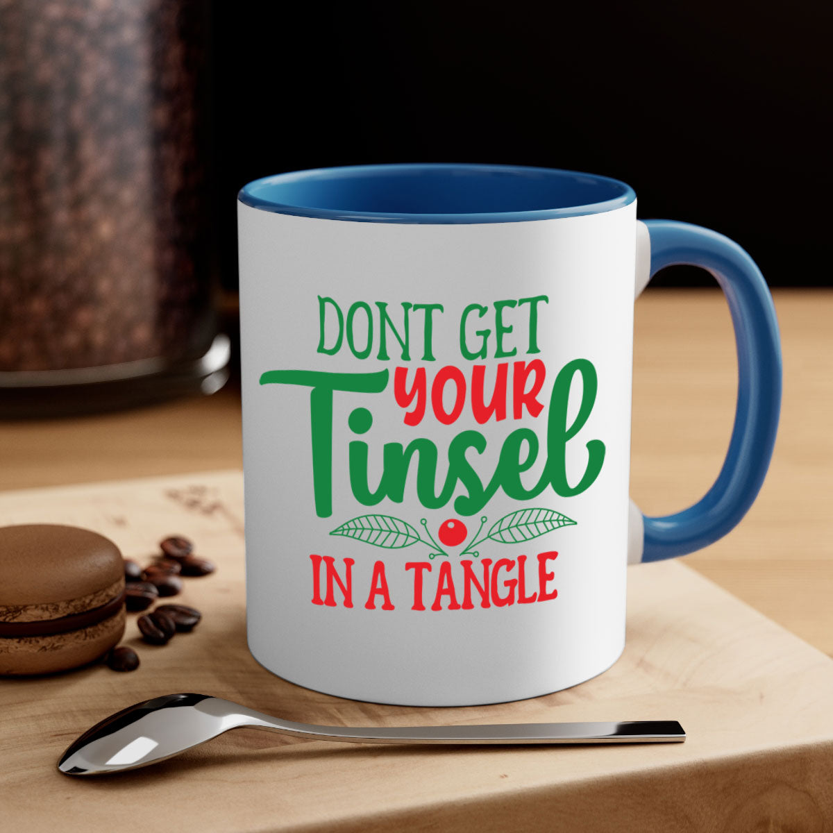 Don't Get Your Tinsel in a Tangle Christmas Mug with a glossy finish, featuring a colored handle and interior, available in multiple colors.